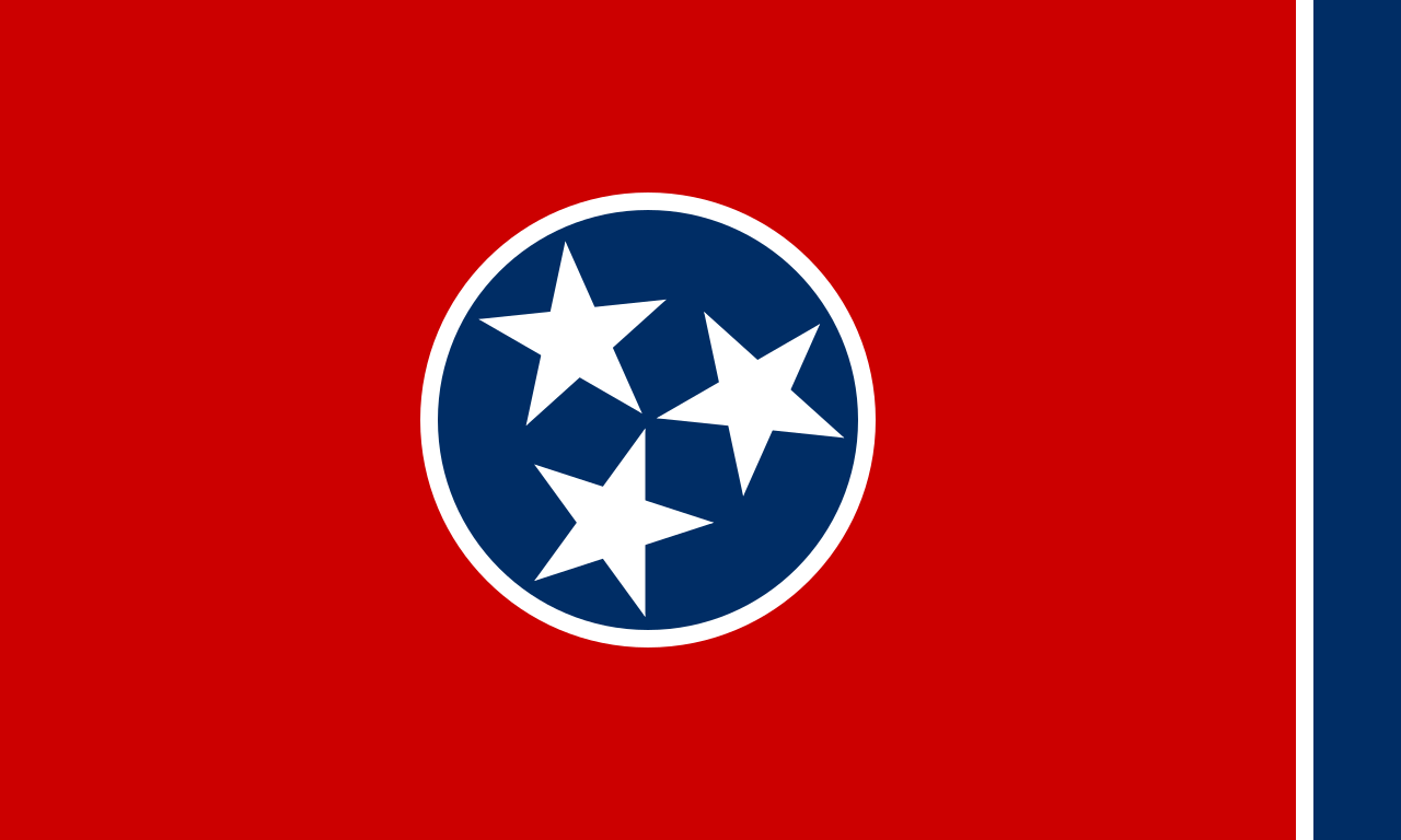 The flag of Tennessee, three white stars on a blue disc across a red field with a blue vertical bar, 1905