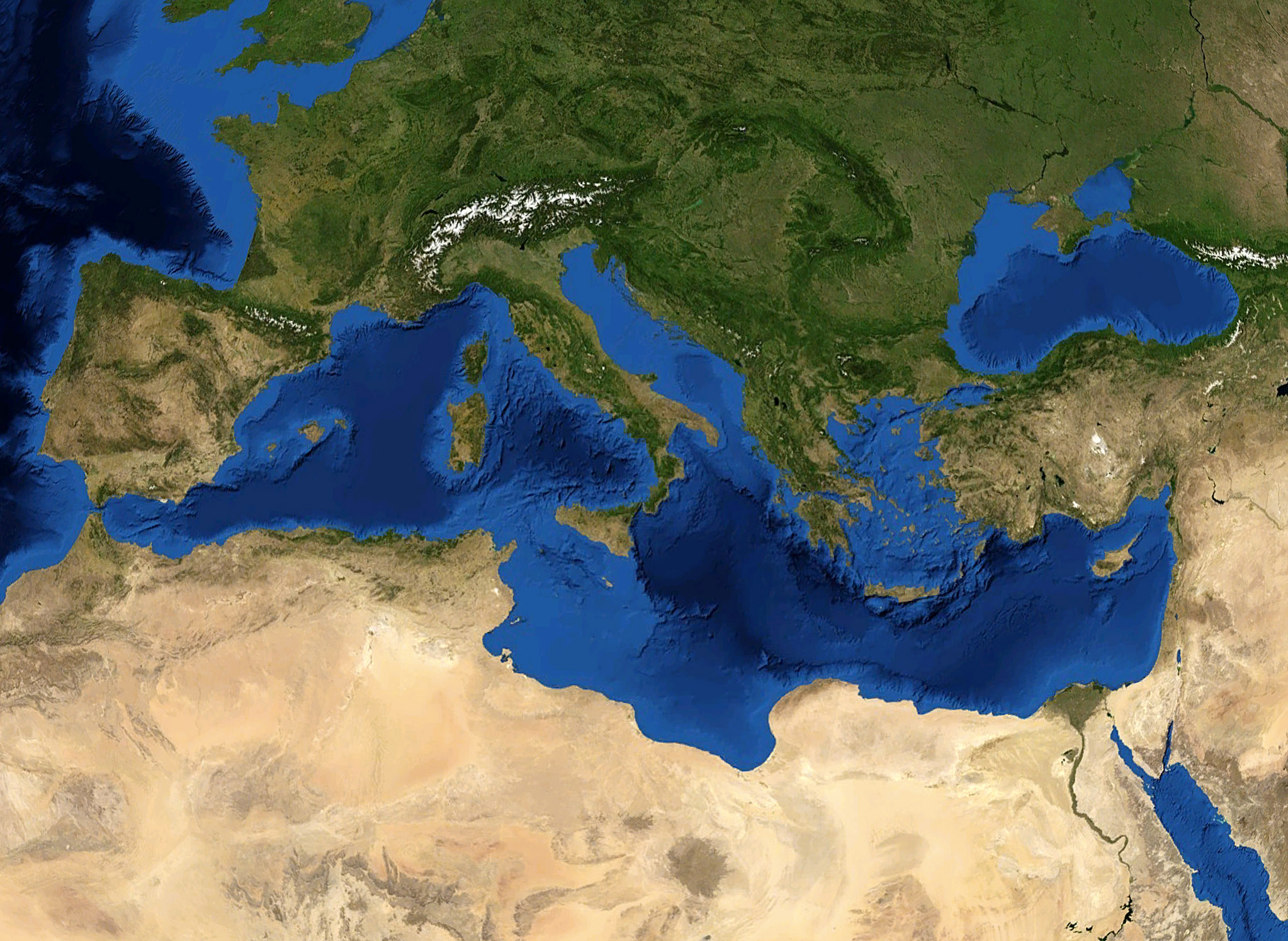 A satellite view of the Mediterranean basin from Iberia to the Levant, deep-blue sea between southern Europe and North Africa under snow-capped Alps, 2010