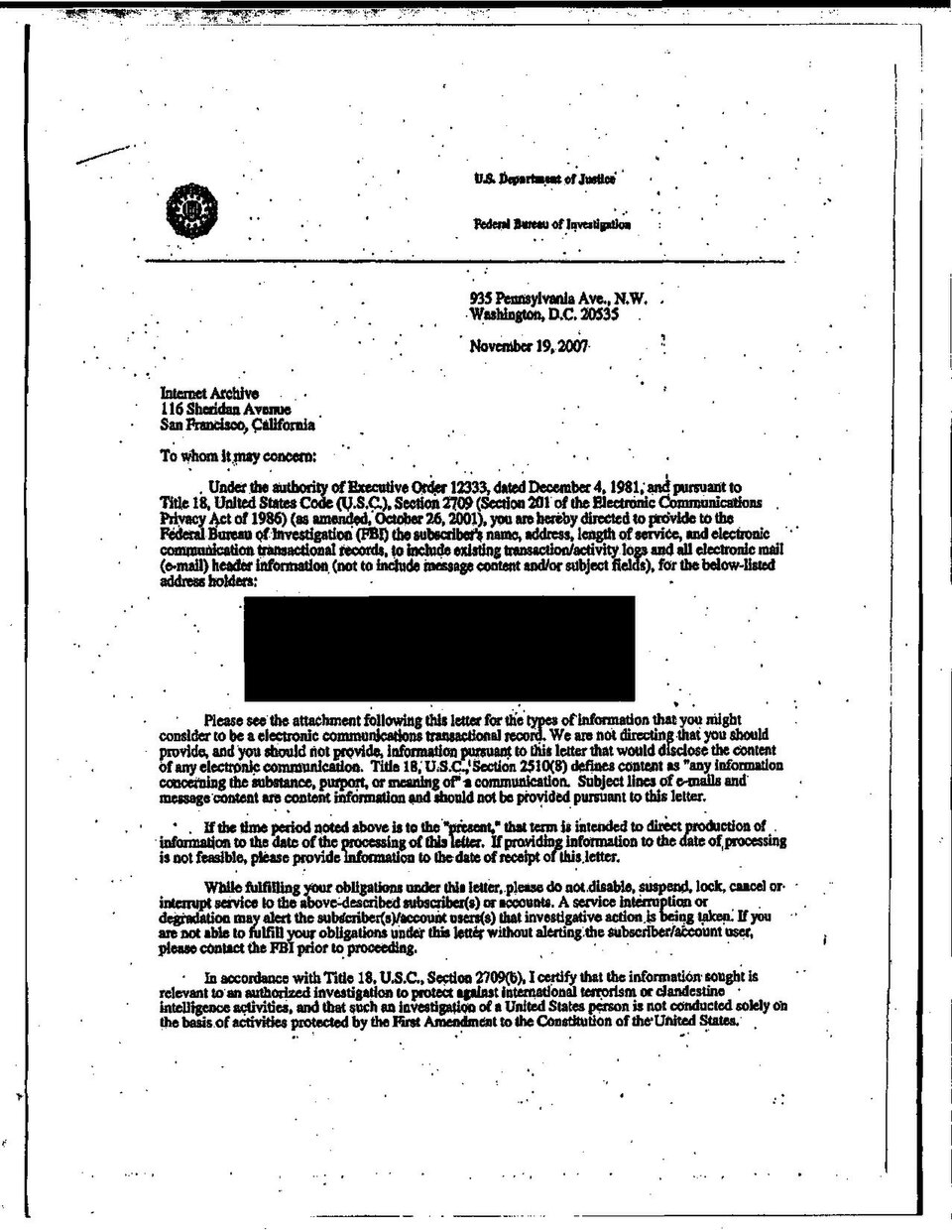 A 2007 FBI National Security Letter to the Internet Archive on Justice Department letterhead, the target address redacted with a black block below the demand for subscriber records, 2007