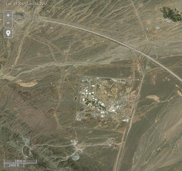 A Google Earth satellite image of the Natanz nuclear facility set into the Iranian desert plateau, marked latitude 33.725 longitude 51.725, 2010
