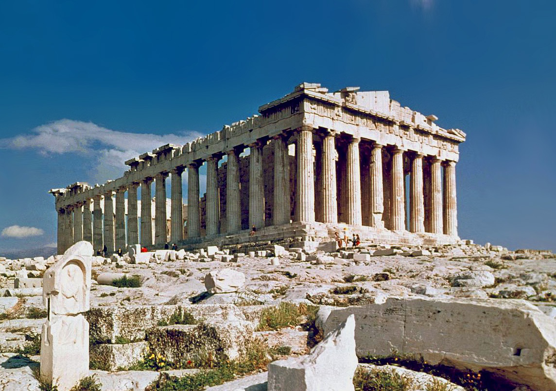 The Parthenon on the summit of the Athens Acropolis, tourists picking through the marble rubble in the foreground, 1978