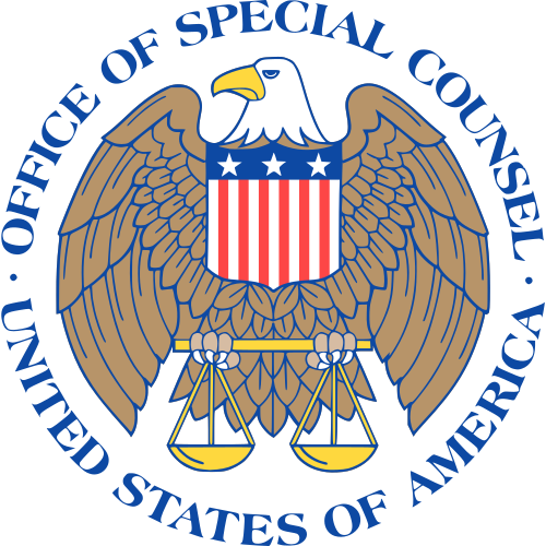 The seal of the Office of Special Counsel, bald eagle above a shield gripping the scales of justice, 1979